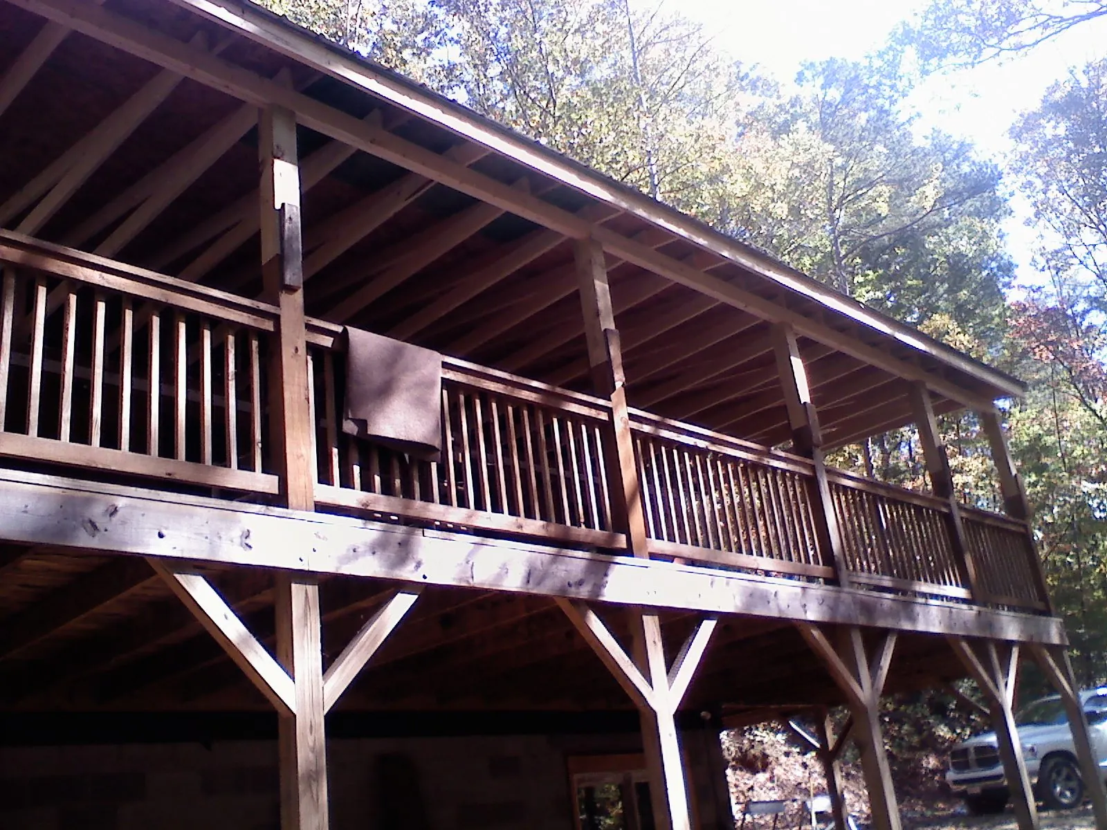 Timber framing under a new elevated porch and deck — Roof Leak Repair in Laguna Beach by Roofing Brothers